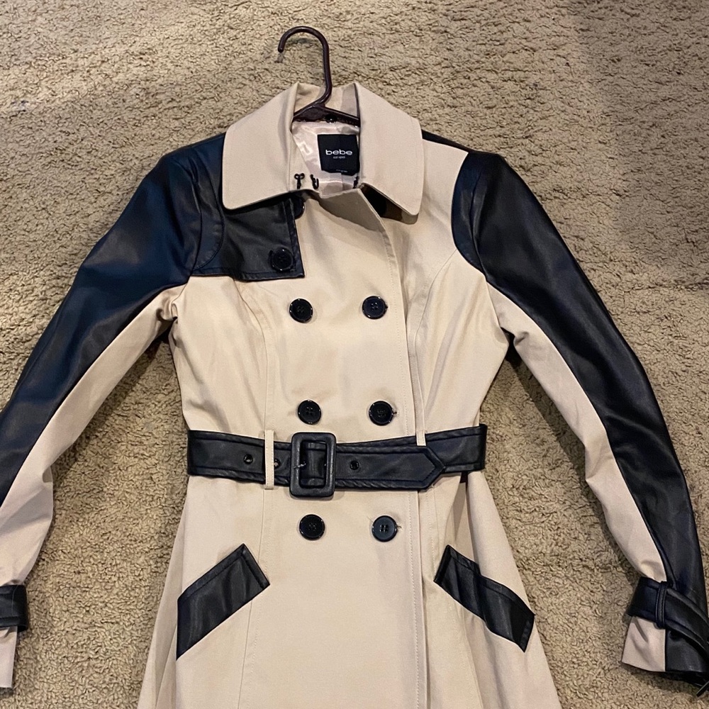 BEBE tan and faux black leather trench coat